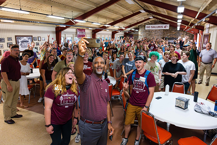 SIU Chancellor Austin Lane poses with students at Dawg Days